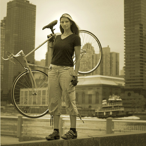 woman riding bike with normal cloth