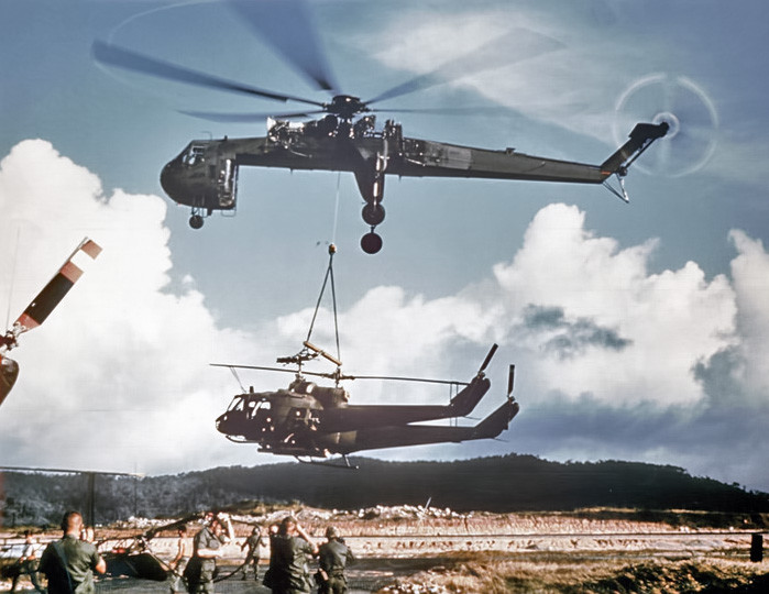 Sikorsky Skycrane carrying 2 Hueys